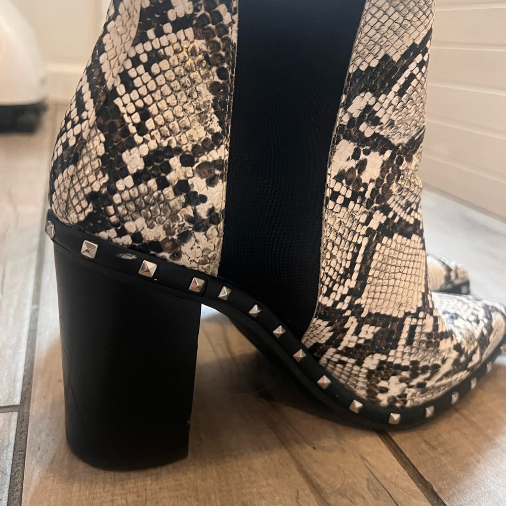 Charles David snake skin ankle boots.